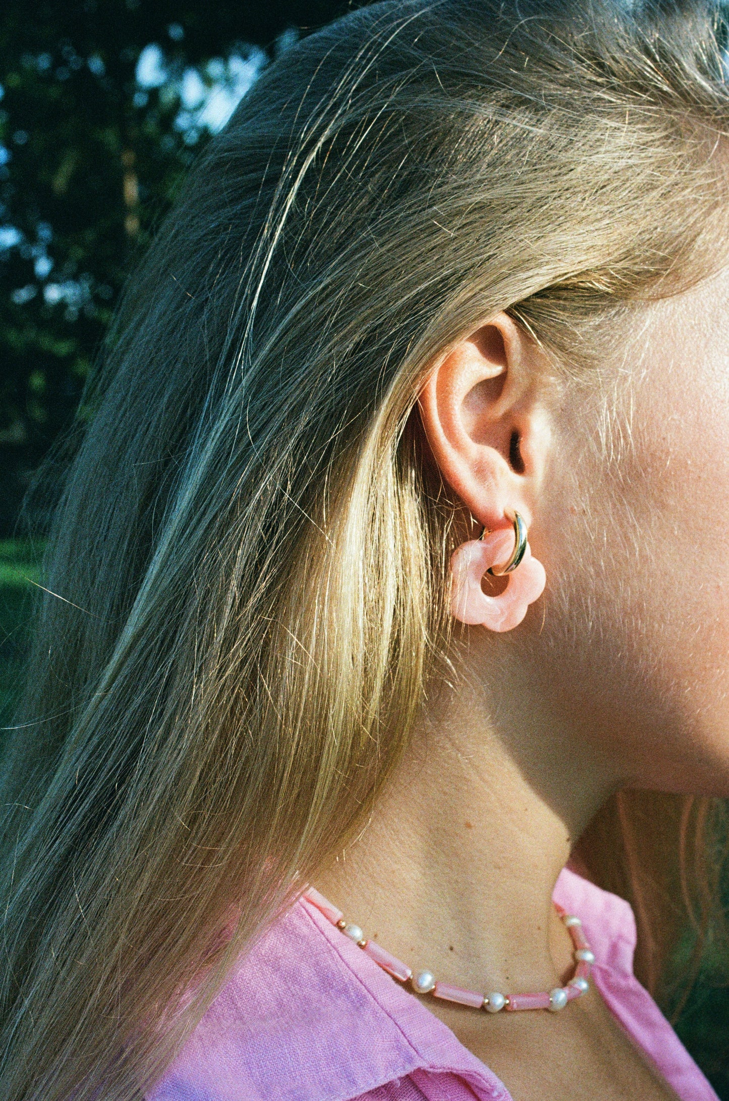 Earrings with flower pendant
